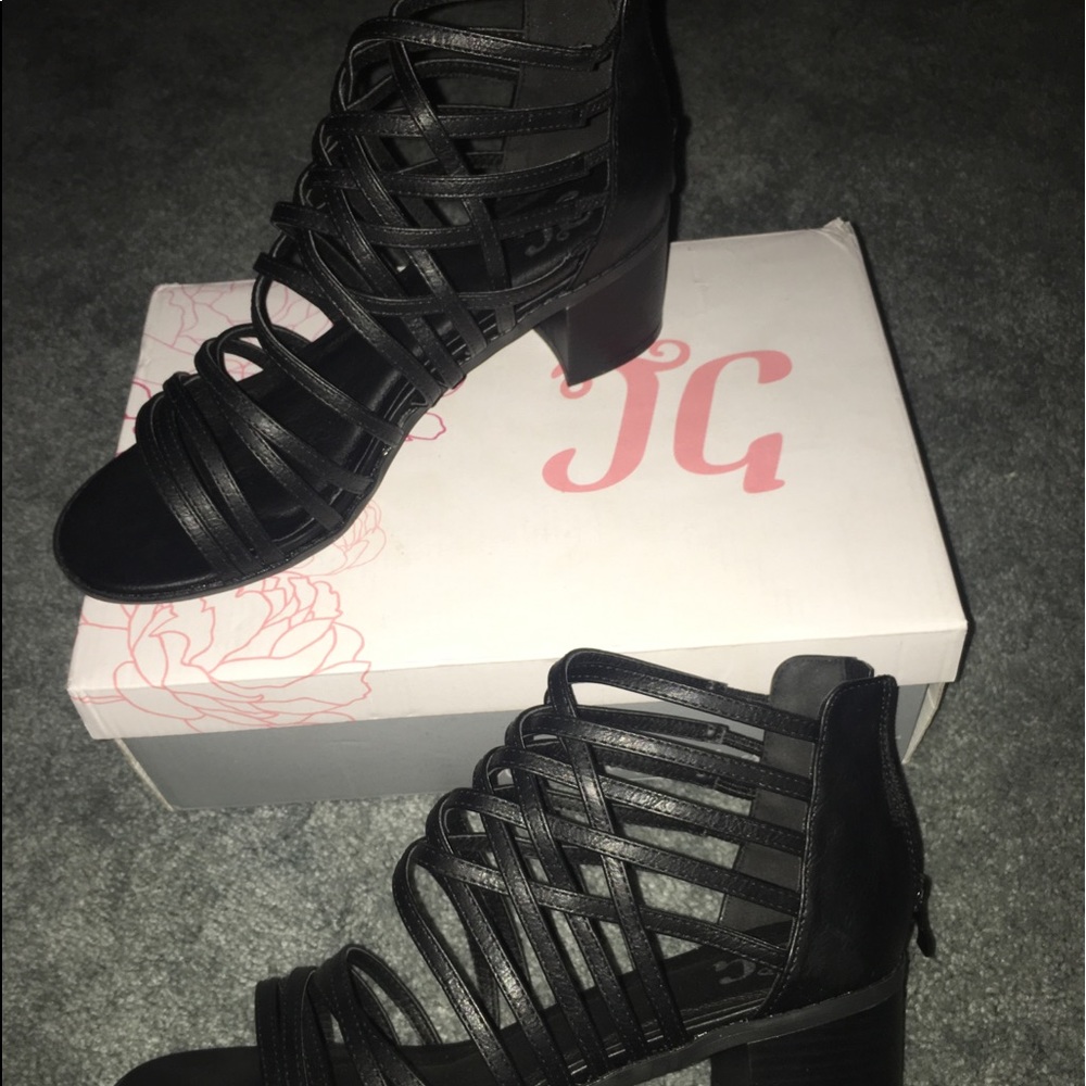 High heel strappy shoes. Black. Still with box!